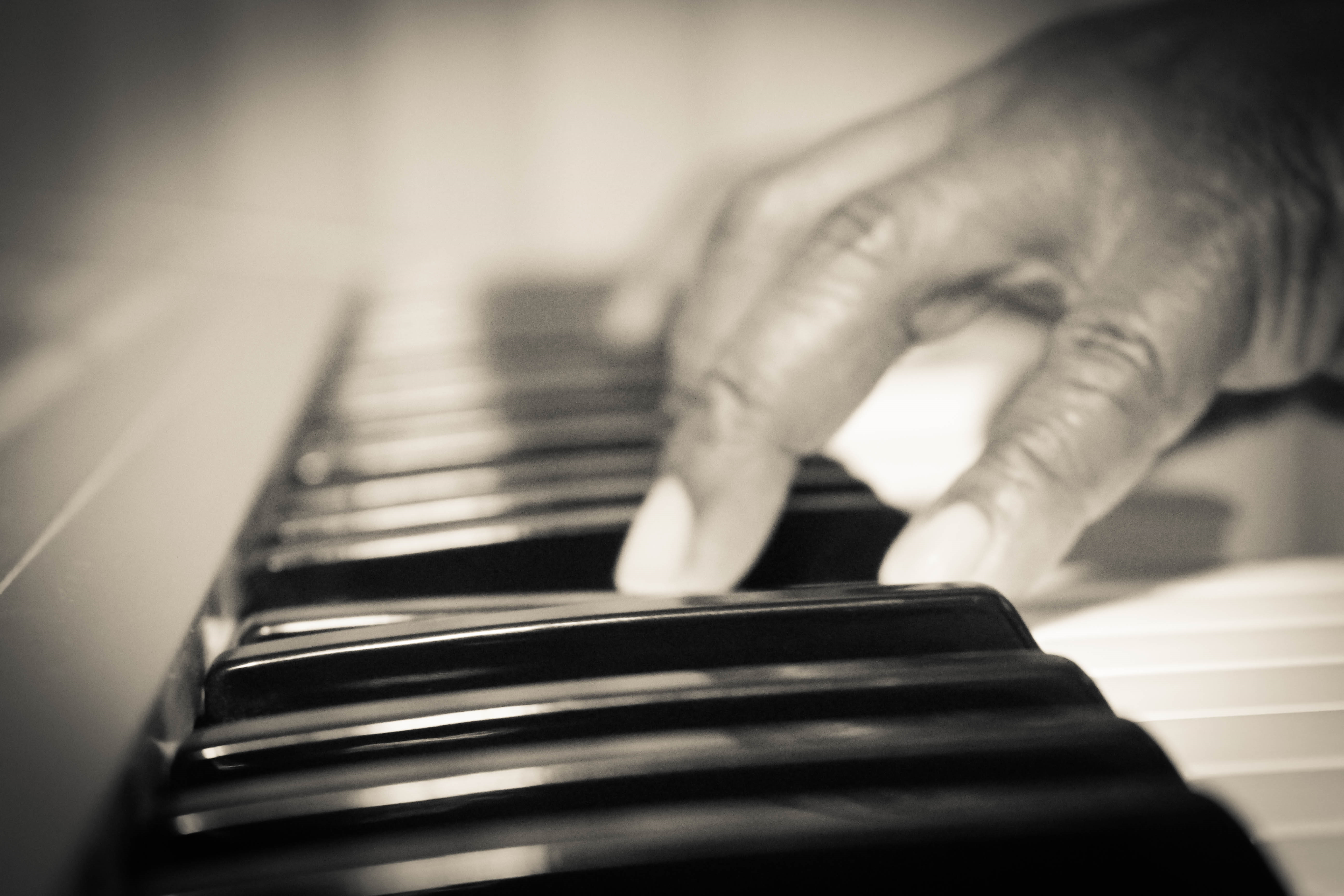 John Tatum playing piano
